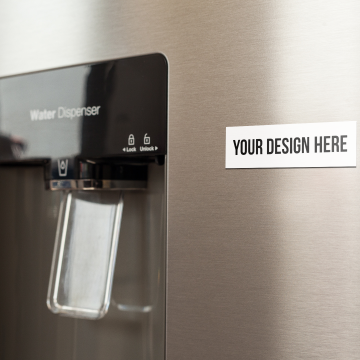 fridge-magnet-mockup-on-a-metallic-fridge-near-the-water-dispenser-a14790